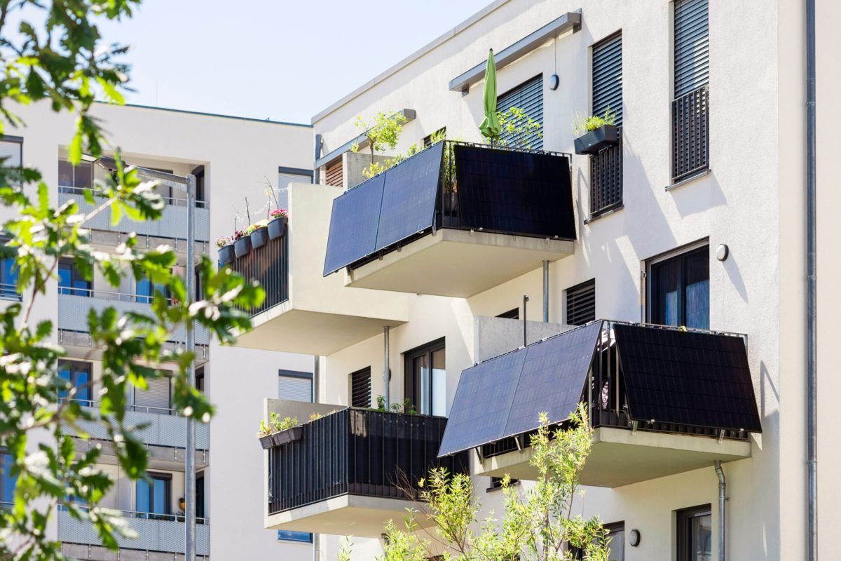 Solar Panels Balcony of Modern Residential Apartment Building Facade. Mini Solar Panel of Apartment Block. Balcony Solar Power Plant.